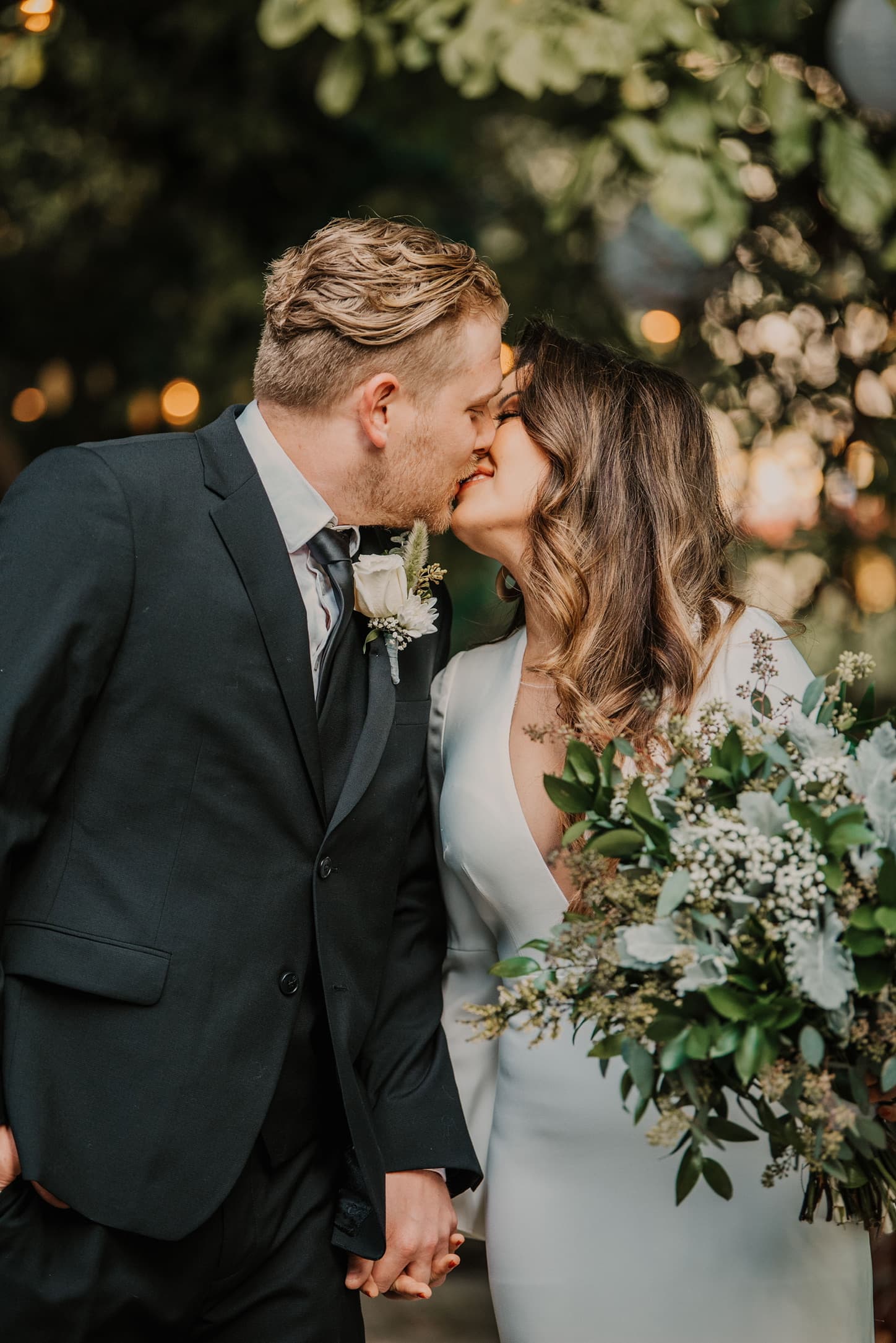 A wedding ceremony beneath the pines at Willow Woods Park, a small wedding venue near Lake Arrowhead