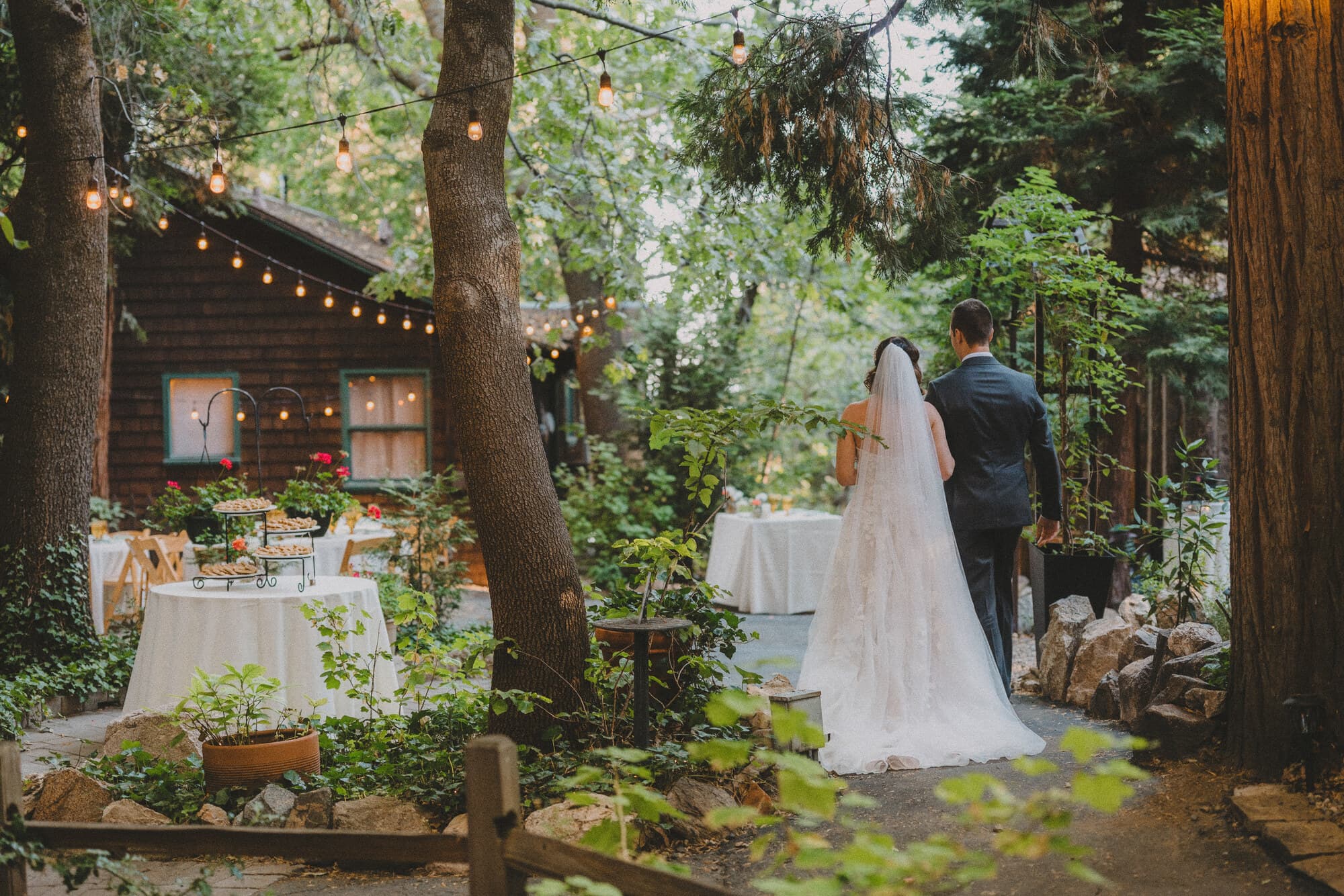 A couple stands near the reception area at Willow Woods Park